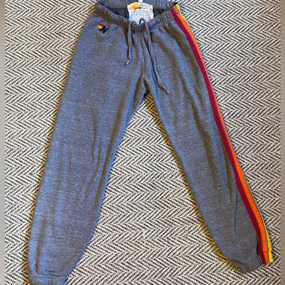 Available Nation 5 Stripe Sweatpants in Grey
